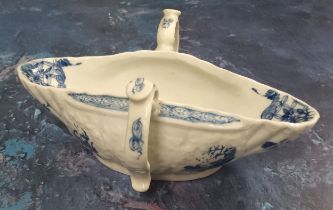 A Worcester  double handled sauceboat,  lobed and moulded, painted with the Two-Handled Sauceboat