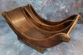 A George III mahogany boat shaped cheese coaster, shaped scroll ends applied with draught turned
