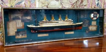 TITANIC - a contemporary diorama of the Titanic,  with cross-section of the ship, newspaper cuttings