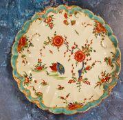 A Worcester Two Quail pattern fluted plate, decorated in the Kakiemon palette, with quails and