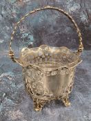 A Victorian silver sweetmeat basket, undulating rim, the sides pierced with scrolling foliage,