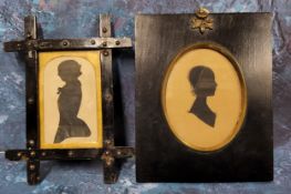 A Victorian cut-card silhouette, of a lady, head and shoulders, oval, 10cm x 7.5cm, ebonised frame;