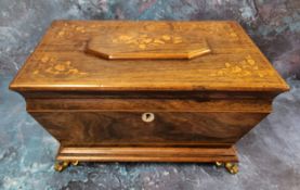 A 19th century sarcophagus mahogany and marquetry sewing box, inlaid with stylised flowers to centre