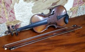A late 19th century violin, two piece back,  stamped Stainer,  length 37cm long, c.1890;  two bows