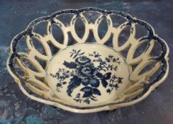 A Worcester Pine Cone pattern shaped circular basket, printed in underglaze blue with peony