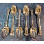 A set of six George IV Scottish silver Fiddle and Shell pattern table spoons, probably James