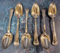 A set of six George IV Scottish silver Fiddle and Shell pattern table spoons, probably James