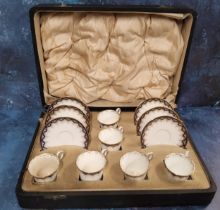 A set of six Wedgwood coffee cups and saucers, banded in cobalt and gilt, printed marks, pattern