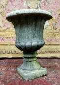 A Victorian style reconstituted gritstone small campana shaped urn, 35cm high