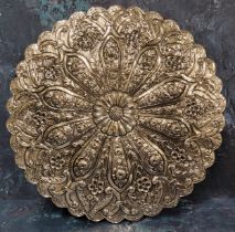 A Turkish/Ottoman silver-coloured metal wedding mirror, the verso embossed with radiating lower