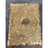An Edwardian silver rectangular card case, chased and engraved with foliate scrolls, hinged cover,