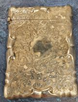 An Edwardian silver rectangular card case, chased and engraved with foliate scrolls, hinged cover,