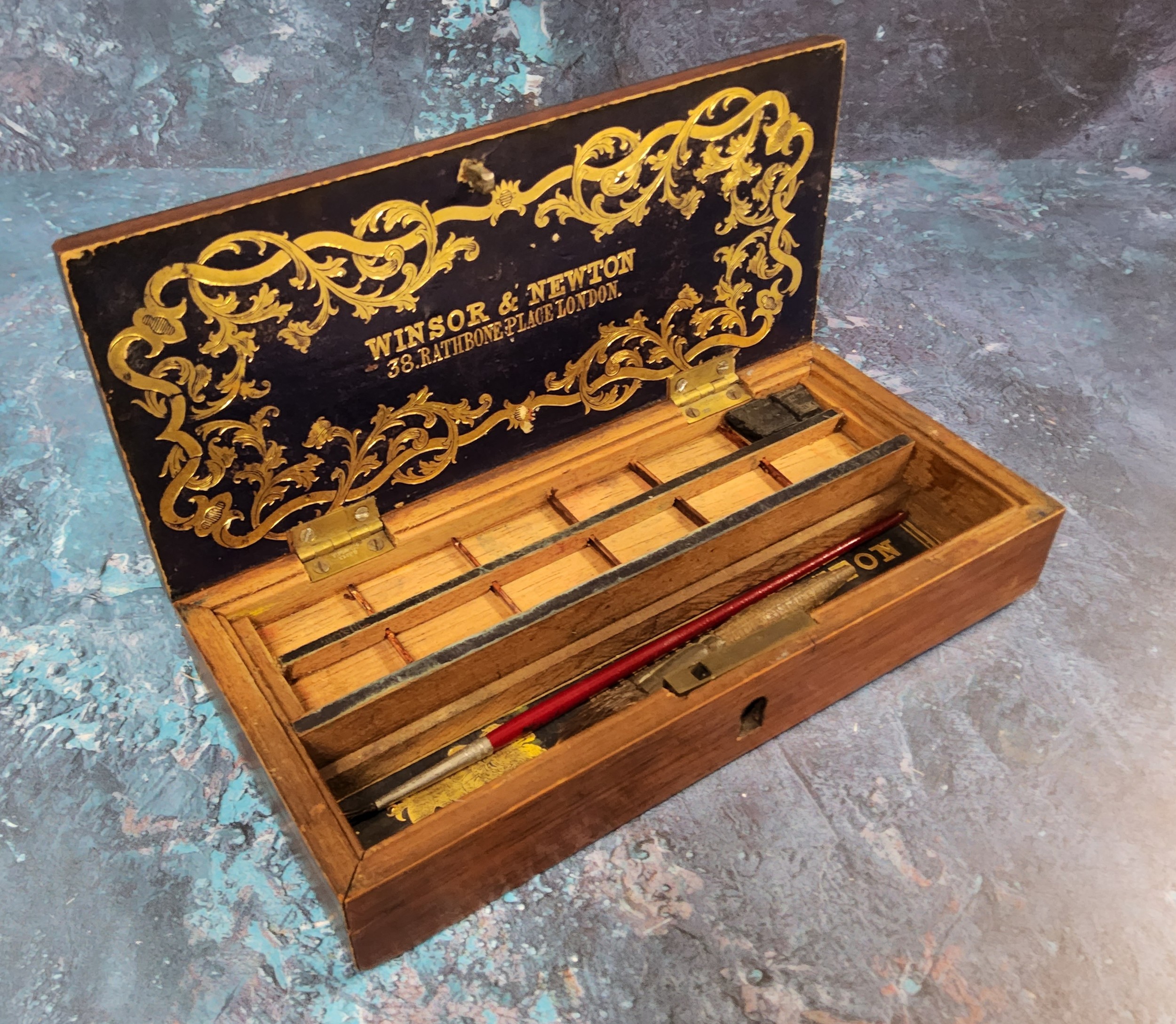 A 19th century mahogany artist box, by Winsor & Newton, 38 Rathbone Place, London, 4cm high, 19.