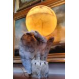 An impressive Art Deco Italian alabaster table lamp in the form of a golden eagle, surmounted with a