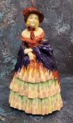 A Royal Doulton figure, a Victorian Lady, 19cm high, HN1276