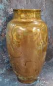 A Pilkington’s Royal Lancastrian ovoid vase, painted by Gordon M Forsyth, with a lion rampant on