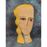 Dorinda Johnson, contemporary, a pottery stylised head, 33cm high,  signed, dated 1995