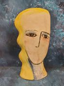 Dorinda Johnson, contemporary, a pottery stylised head, 33cm high,  signed, dated 1995