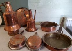 Copper Ware - an Indian copper pan, steel handle;  others;  a copper sieve;  two jugs;  etc