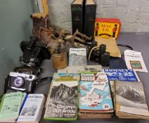 Mountaineering - climbing boots, axe, Carl Zeiss binoculars;  Olympus Trip camera'  Rock Climbers