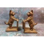 A pair of cast metal terrier bookends, 14cm high, c.1930