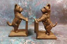 A pair of cast metal terrier bookends, 14cm high, c.1930