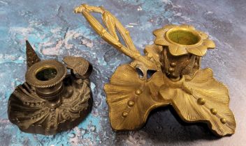 A Regency dark patinated bronze chamberstick, leafy base, 7cm diam, c.1815;  another, Victorian,