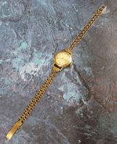 A 9ct gold lady's Ernest Borel Mappin wristwatch, Swiss 17 jewel movement; cream dial, Arabic