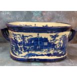 A reproduction blue and white two handled foot bath, 49cm wide