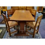 Thomas 'Gnomeman' Whittaker (1912-1991) golden oak dining set, circa 1960, including a refectory