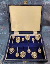 A set of six sterling silver Mocha coffee spoons, terminating in an oval embossed in relief with