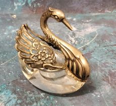 A German silver mounted bon bon dish or salt, modelled as a swan with articulated wings above a