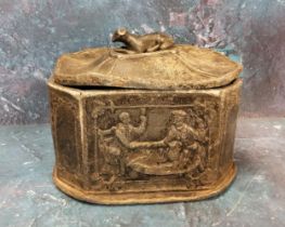 A 19th lead canted rectangular  tobacco box, the sides with jolly topers, greyhound finial, 9.5cm