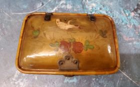 A 19th rectangular horn snuff box, the cover painted with a song bird above flowers and foliage,