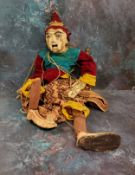 A mid 20th century Eastern puppet, wooden head, legs and arms, 66cm high