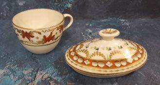 A Pinxton Bute shaped teacup, pattern 312 decorated with a broad band of scrolling lilies in red and