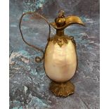 A 19th century French gilt metal and mother-of-pearl novelty scent bottle, in the form of a ewer,