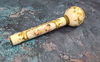 A Victorian porcelain parasol handle, decorated with cherubs within a gilt cartouche, on a white