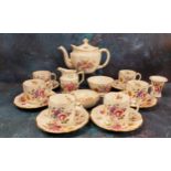 A Royal Crown Derby Posies pattern tea service, comprising teapot and cover, milk jug, sugar bowl,