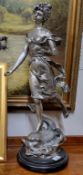 Henryk Kossowski (French, 1855-1921) silvered hollow cast  figure, of a maiden, standing on a