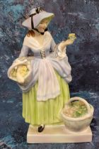 A Royal Doulton figure, Spring Flowers, 18cm high, HN1807