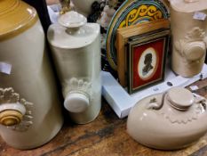 Stoneware hot water bottles;  modernist sculpture, of a head;  Capo-di-mote;  Denby;  etc
