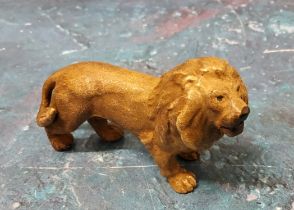 An Austrian cold painted bronze model, of a lion, 8cm wide