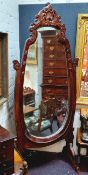 A Victorian style mahogany cheval mirror,  carved and pierced acanthus scrolling details throughout,