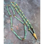 A native American turquoise bead necklace;  another (2)