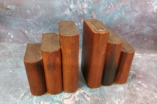 A pair of teak bookends,  'Made from teak wood from the RMS Mauretania', 14cm high