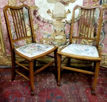 An elegant pair of Edwardian Sheraton Revival bedroom chairs c.1905