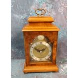 An Elliott mantel clock, silvered capter ring, Roman numerals,  the dial signed H L Brown & Sons,