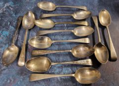 Twelve silver Old English pattern dessert spoons, each engraved EW 1918, C W Fletcher & Son Ltd,