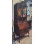 An early 20th century Queen Anne style bureau bookcase, c.1930